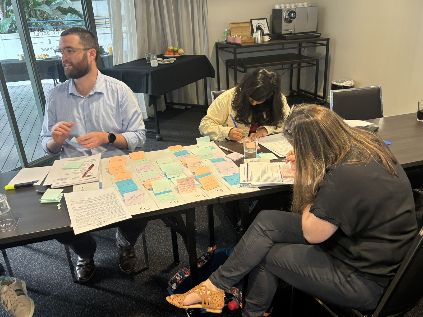 Participants writing during an Investigation Report Writing workshop